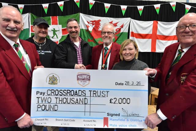 Members of Mansfield & District Male Voice Choir presented a cheque to the Crossroads Trust at the concert. Photo: Submitted