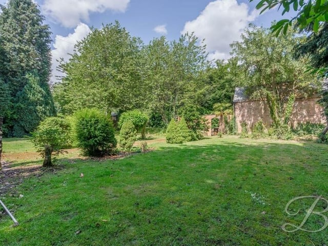 The final photo of our gallery offers one last look at the rear garden, which is the ideal spot for families to relax, play or entertain.