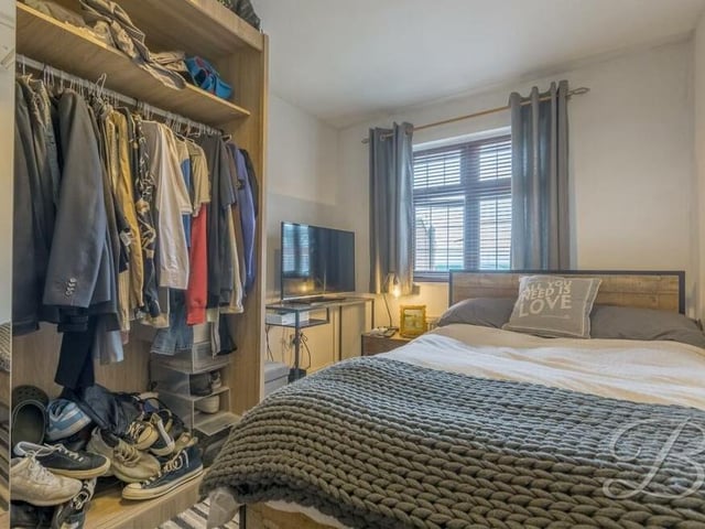 "All you need is love" is the message on the cushion in bedroom number three at the £365,000 Edwinstowe property.