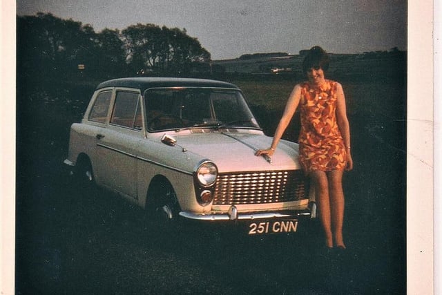 Linda Biggs with her first car.