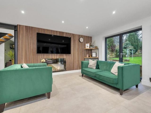 Additional assets within the living/dining area are double-glazed French doors giving access to the back garden, and a full-height, contemporary column-radiator.
