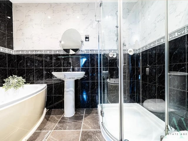 The property boasts a stylish family bathroom.