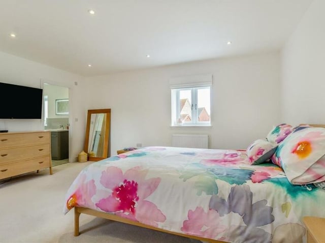 A second glance at the master bedroom, which benefits from attractive 'extras', namely an en suite shower room and a walk-in wardrobe area.