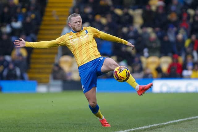Mansfield Town defender Frazer Blake-Tracy(22) during the Sky Bet League 1 match against Huddersfield Town FC at the One Call Stadium, 07 December 2024, Photo credit Chris & Jeanette Holloway / The Bigger Picture.media