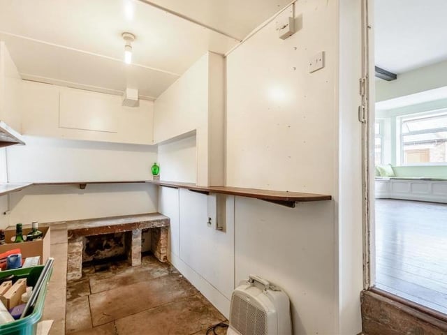 Useful additions to the ground floor are a pantry, which has a connecting door through to a store. Both rooms boast an original butcher's stone slab, while the pantry also has shelving and the store has a flagstone floor and a cupboard housing a gas-fired central heating boiler.
