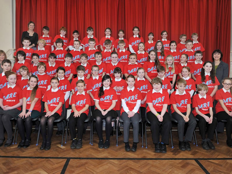 DARE graduation at High Oakham Primary School in 2014, pictured with pupils are Miss Smith, Mrs Smith and Mrs Parrett.