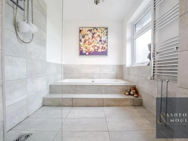 The bathroom has been designed with functionality in mind to support busy daily routines.