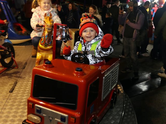 Ringing the fire engine bell is Joey Mayes in 2017.