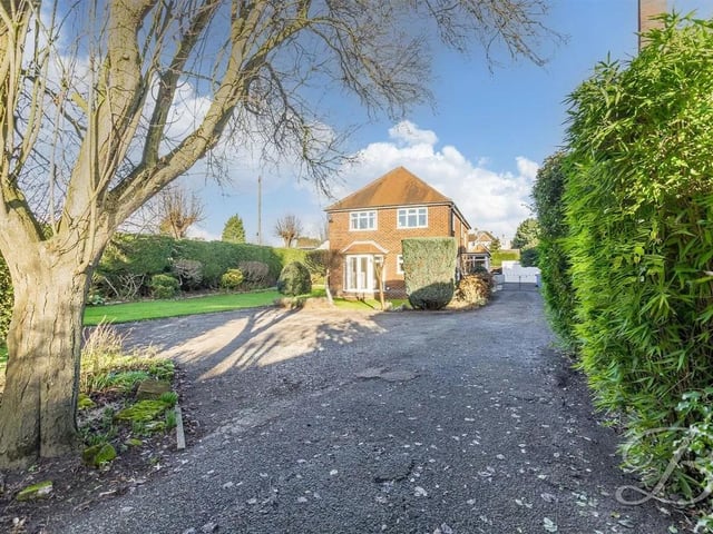 This property accommodates a driveway to the front with off road parking for added convenience, a double garage and workshop.