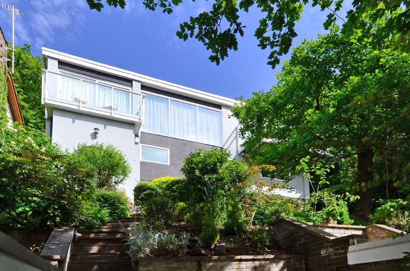 "A fabulous, architect designed contemporary property with breathtaking, panoramic views towards the Derbyshire Moors."