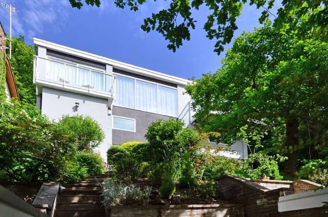 "A fabulous, architect designed contemporary property with breathtaking, panoramic views towards the Derbyshire Moors."