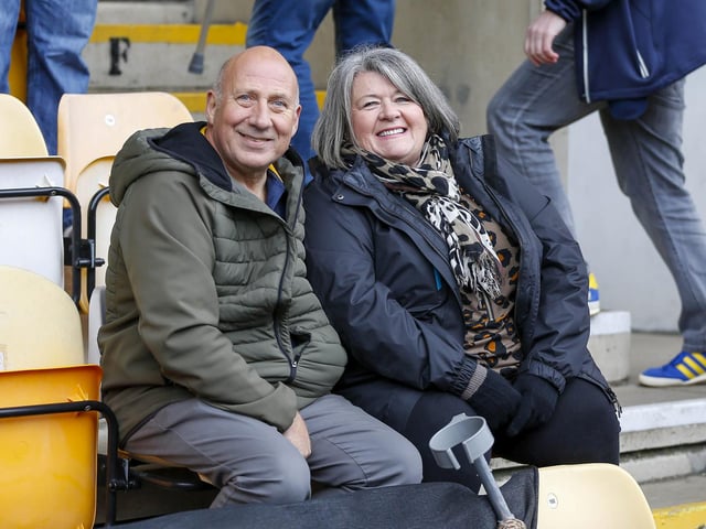 Travelling Stags fans watch the Sky Bet League 2 match against Bradford City.