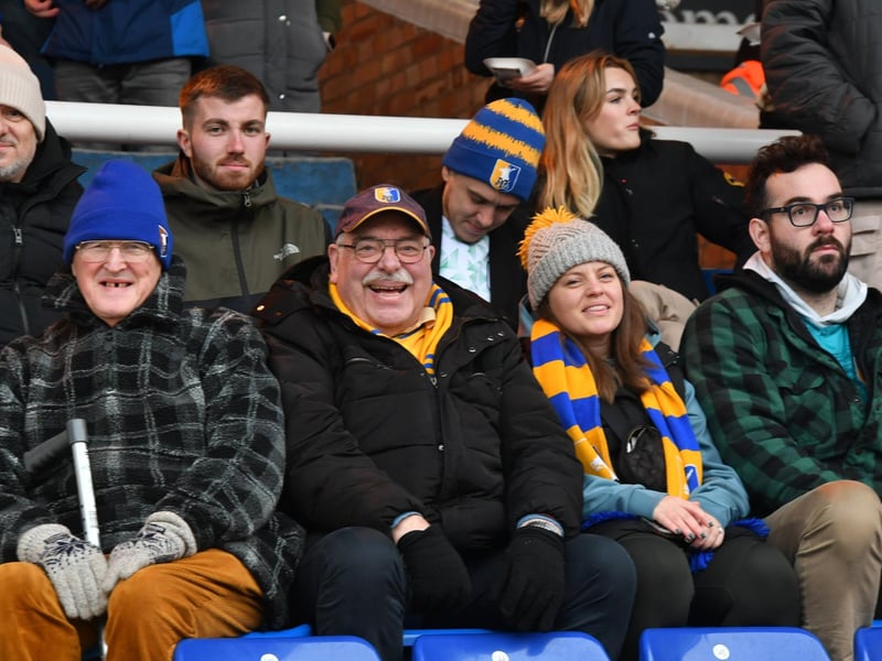 Mansfield Town fans watch the brilliant win at Peterborough United.