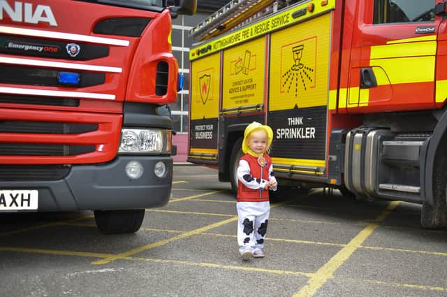 Two-year-old Emily Hooper at Ashfield fire station open day.
