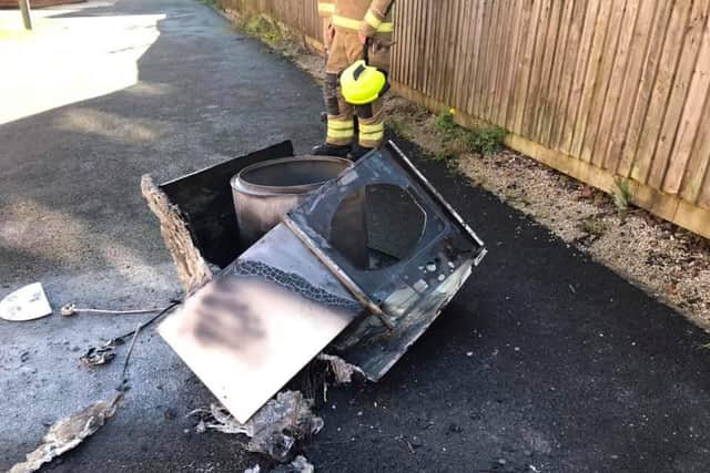 The burnt out tumble drier at Kirkby