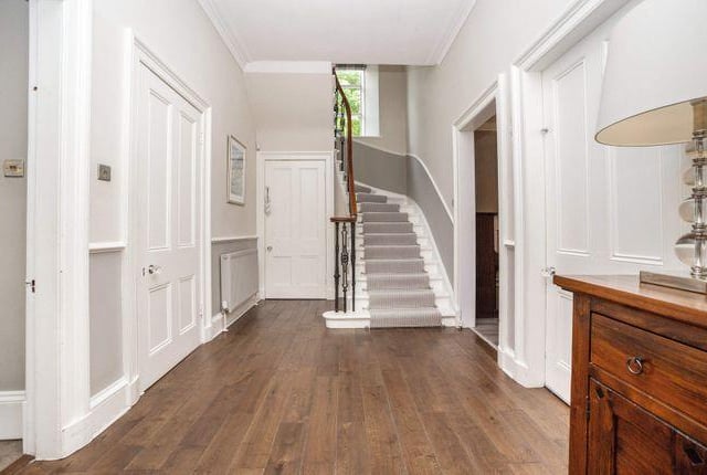 The modern hallway is spacious and flooded with natural light