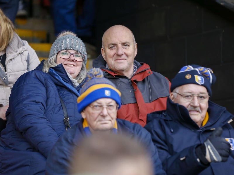 Stags fans watch the Sky Bet League 2 match against Walsall FC at the Bank's Stadium.