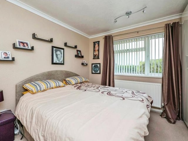 Time to look at the three bedrooms. The main two are doubles, which are an identical size, with one facing the front of the property and the other facing the back.