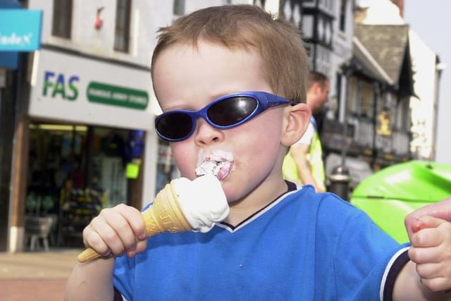 Four year old Callie Ramsay from Kirk Sandall enjoying an icecream in the Doncaster town centre, 2001.