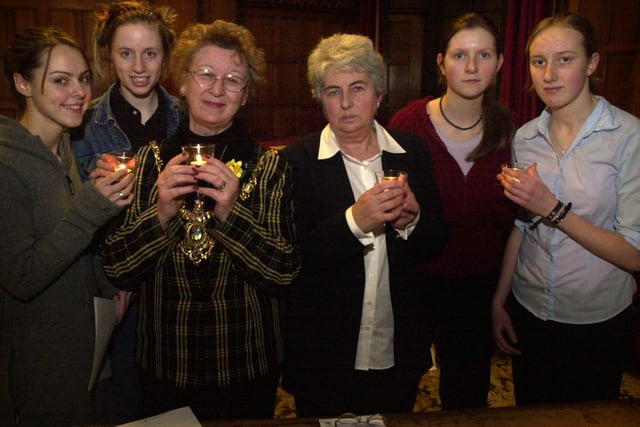 A Holocaust Memorial Day ceremony of remembrance was held in the reception rooms at Sheffield Town Hall on January 27, 2003. The Lord Mayor of Sheffield, Coun Marjorie Barker, and leader of the council Coun Jan Wilson light their candles with students from Tapton School who gave readings at the ceremony. They are from left to right, Helen McCulloch, 17, Lizzie Winter, also 17, Anna Harvet, 15 and Jenny Love, 16