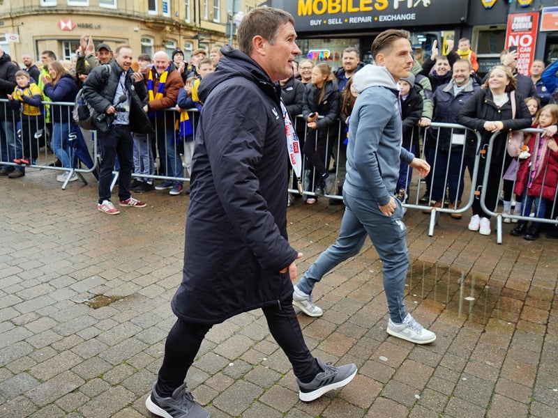 Crowds packed into Mansfield town centre this afternoon to salute their heroes.