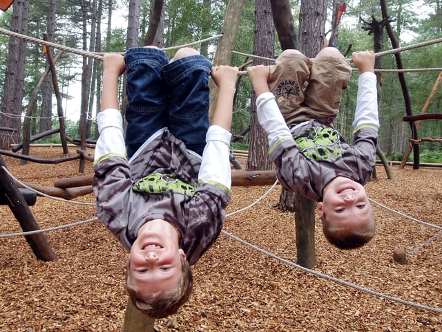 Sherwood Pines features a fun-packed play area, with a climbing frame and two tree houses to explore. Pictured are Cory Simpson, nine, and his brother  Hayden Simpson, six enjoying the adventure play area at Sherwood Pines.