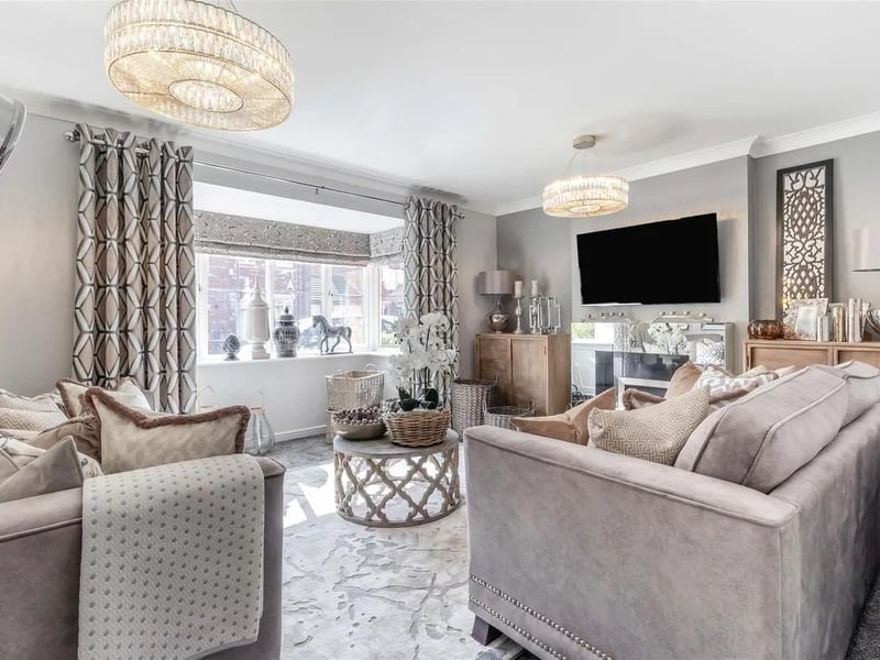 The beautifully appointed lounge, features a modern fireplace with inset gas fire with hearth and mirrored surround. Radiator, coving to ceiling and double glazed bay window to the front elevation.
