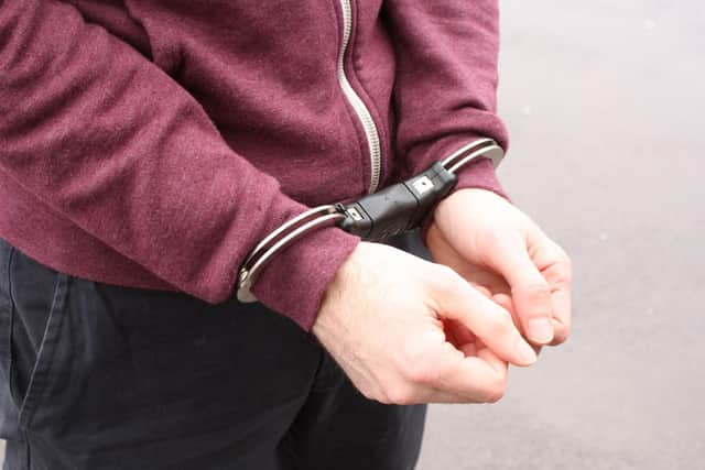 A teenager has been arrested.