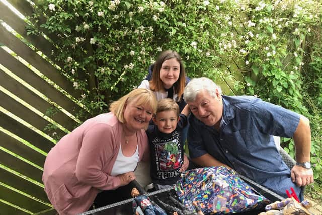 Mick and Dawn with two of their grandchildren, Rhianna and Joey.