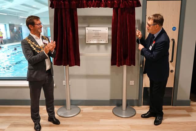 Warsop Health Hub opened by Mansfield Mayor Andy Abrahams seen with Graham Hall MEB unveiling a plaque.