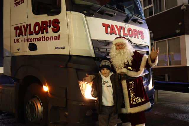 Nate met with Santa and was given a ride in a Taylor's truck