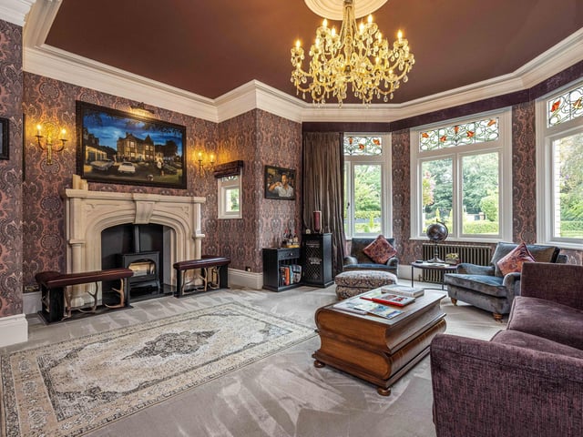 One of two spacious formal reception rooms taking in views over the front elevation, the perfect spaces in which to host parties and events alike.