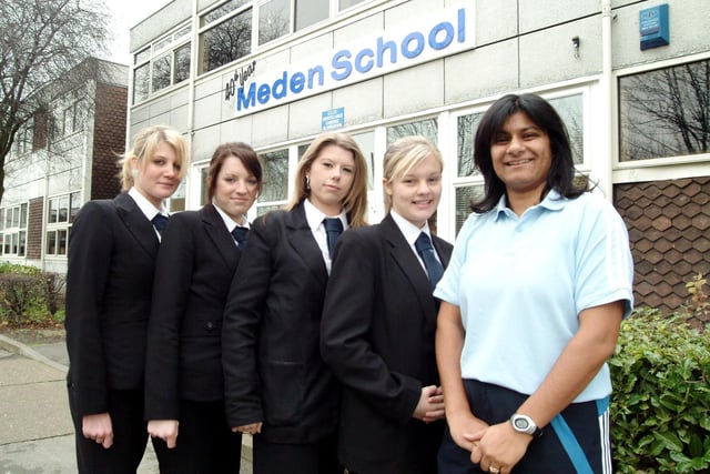 Kamal Harvey-Mistry PE Teacher at Meden School, Warsop, right and pupils left Tara Wheatley, Olivia Swycher, Lisha Rhodes and Sophie Jerram before their visit to Brazil as part of a cultural project involving children's rights, football and dance. 2006.