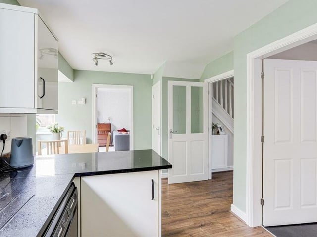 The kitchen diner also includes a built-in, under--stairs storage cupboard, plus recessed spotlights and space and plumbing for a washing machine or dishwasher.