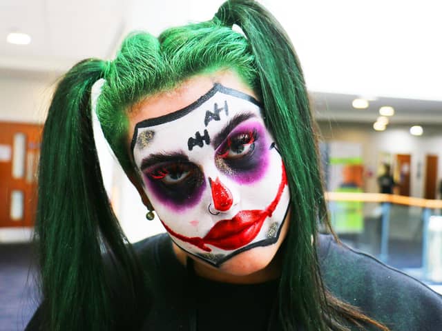 Martinez Slater, 19, summoned up the Joker character.