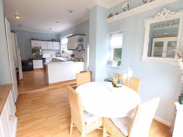 The open-plan dining area and breakfast kitchen.