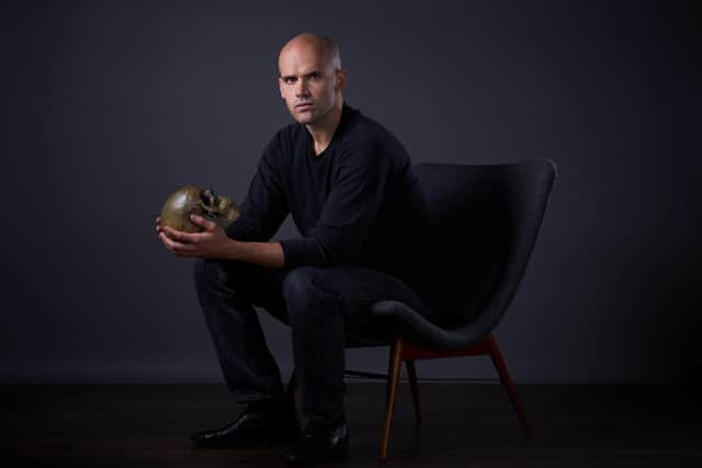 Ralph Davis plays the lead role in Hamlet