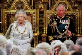 Queen Elizabeth II and her son King Charles III, then Prince Charles, Prince of Wales, at the State Opening of Parliament in 2019.