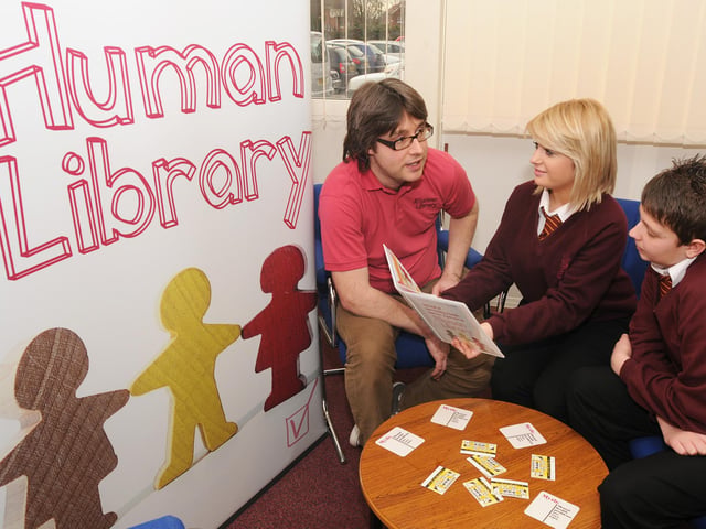 Pupils at the Dukeries college Ollerton take part in a scheme called the Human Library, taking to people as living books. From the left are Jonathon Wright Nottinghamshire health care Chloe Shaw and Charlie Froggatt. 2011. .