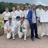 Members of Wellow Exiles Cricket Club receive the £300 donation from Mansfield Building Society.