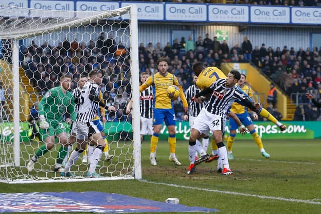 Mansfield Town forward Lucas Akins during the Sky Bet League 2 match against Notts County FC at the One Call Stadium, 03 Feb 2024, Photo credit Chris & Jeanette Holloway / The Bigger Picture.media