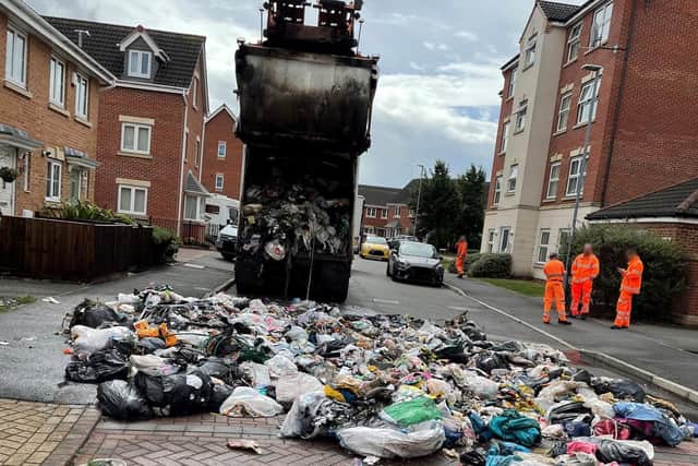 Part of the load had to be emptied onto the street.