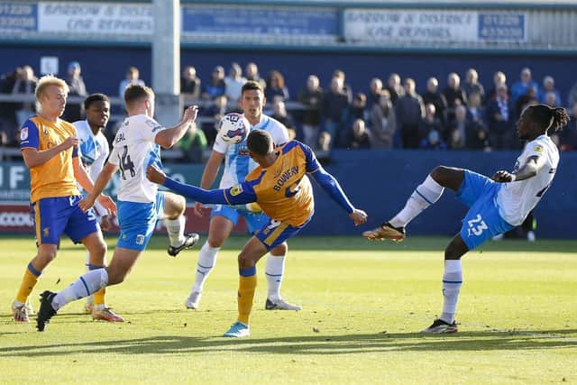 Matchwinner Jordan Bowery challenges for the ball at Barrow on Saturday. Photo by Chris Holloway/The Bigger Picture.media.