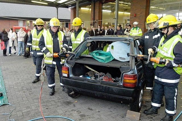 Pupils from schools in the Ashfield area at Ashfield Fire Station witnessing a 'rescue' from a vehicle in a Road Traffic Accident. It was all part of a Traffic Collision Awareness Day. But which year?