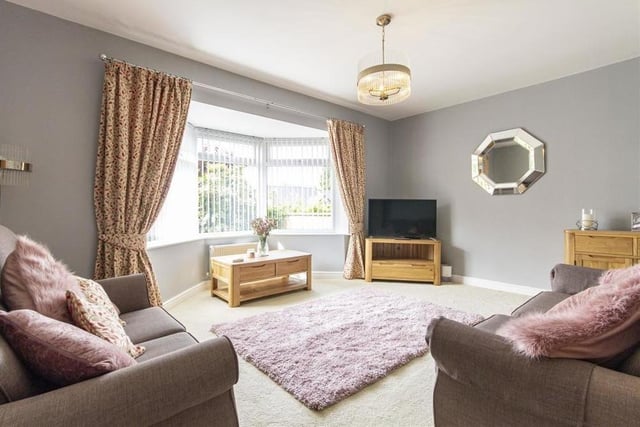 The living room offers a touch of luxury, don't you think? It is also a fine size, with a bay window overlooking the back garden.