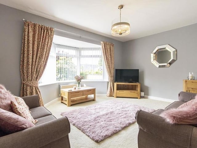 The living room offers a touch of luxury, don't you think? It is also a fine size, with a bay window overlooking the back garden.
