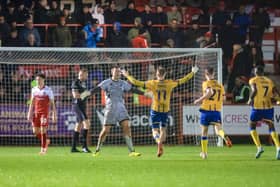 Mansfield Town goalkeeper Owen Mason (12) during the Emirates FA Cup second round match against Accrington Stanley FC at The Wham Stadium, 06 Dec 2025, Photo credit Chris & Jeanette Holloway / The Bigger Picture.media