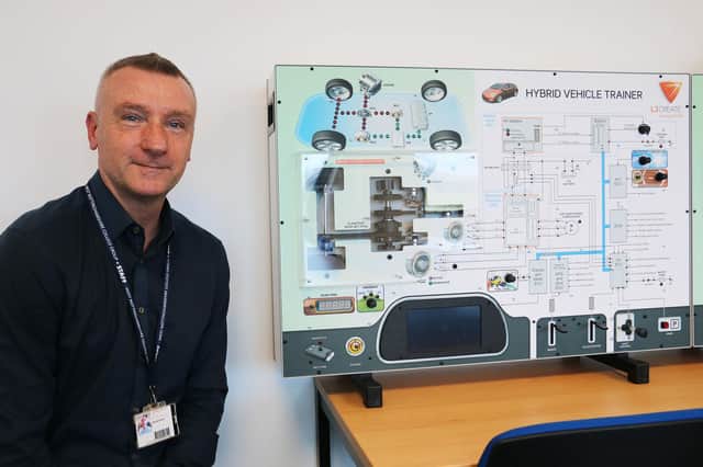 Head of automotive Pete Brochocki in the vehicle simulation training room