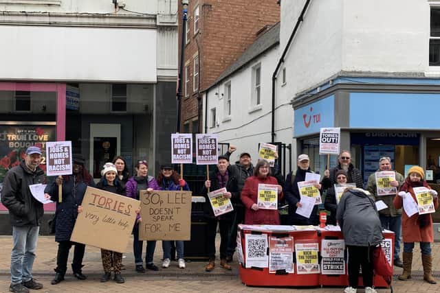 Residents, trade union members and activists 'unite' to show support for asylum seekers.
