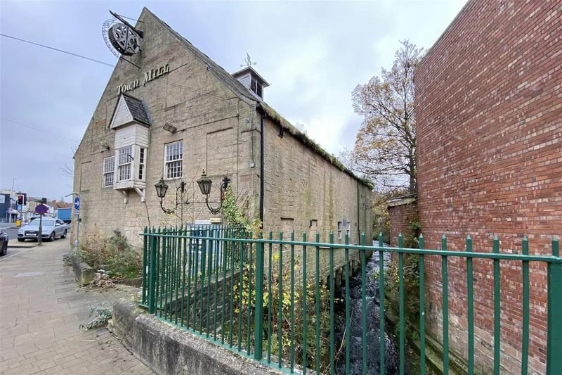 This huge freehold property is listed for £550,000 and boasts three floors and a riverside location in Mansfield centre. The Grade II listed building has been stripped for refurbishment and has planning permission for a brewery, public house and training centre with letting bedrooms. It has a gated entrance leading to a large car park and garden area.